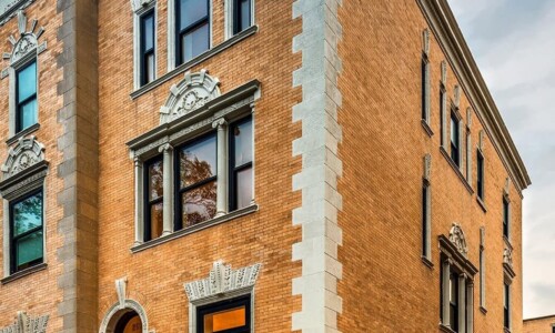 Historic brick building with ornate architectural details.