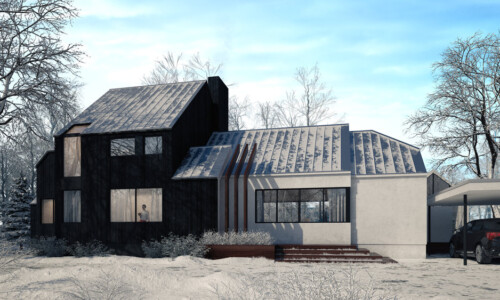 Modern house with snow-covered roof and trees.