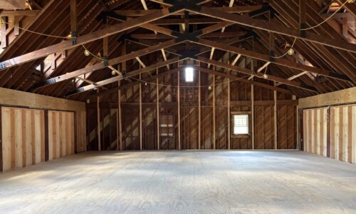 Renovated attic with plywood subfloor